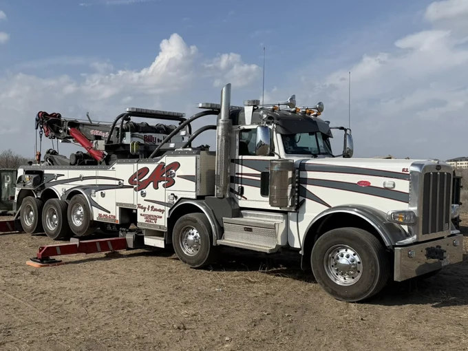 Tow truck providing towing services in Killeen TX for roadside assistance and vehicle recovery